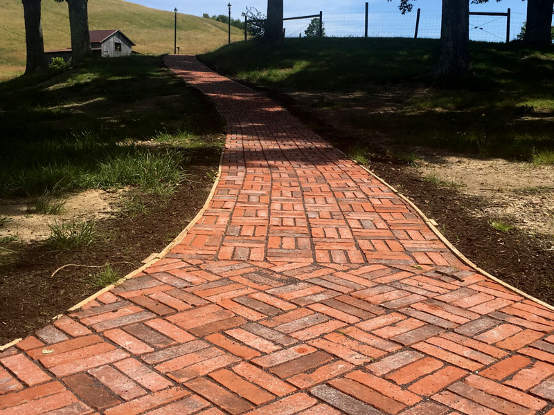 completed side walk using thin brick pavers
