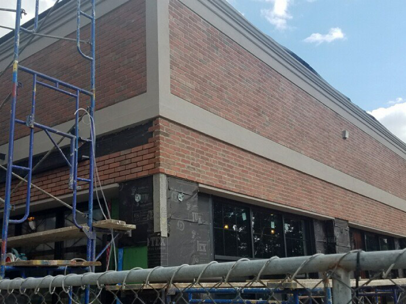 thin brick installation on exterior of a commercial building